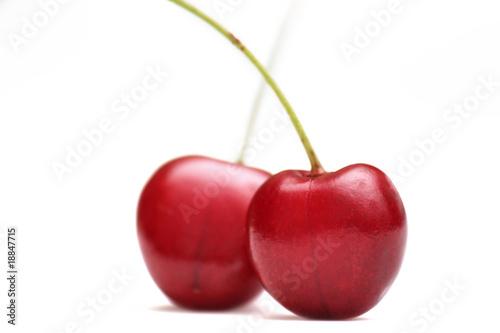 two red ripe mazzard cherries isolated on white