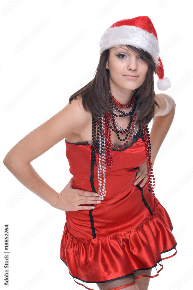 Close up portrait of girl in santa dress and beads Close up portrait of girl in santa dress and beads