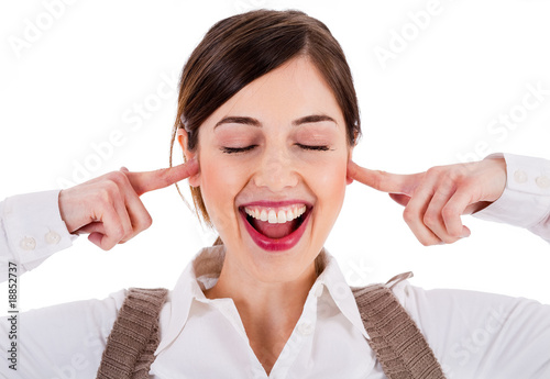 smiling young attractive model closing her eyes and ears