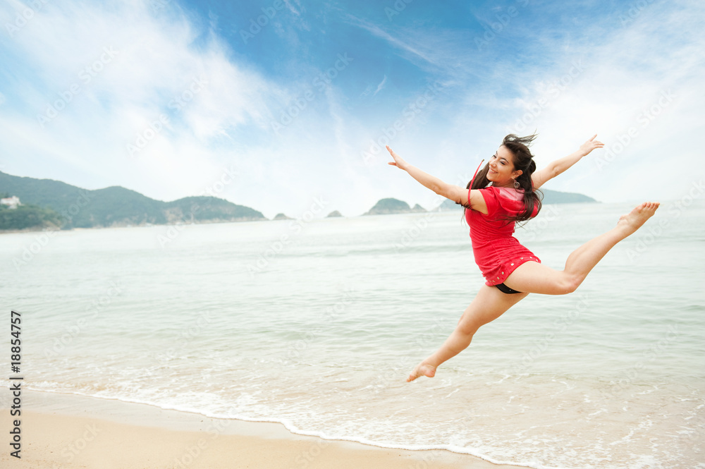 Beautiful young woman jumping in the sea .. Beautiful young woman jumping in the sea ..