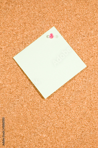 memo board with empty note on white background
