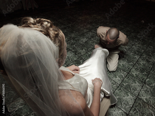 Tablou pe pânză Removal of the garter belt
