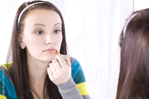 Teenager Putting on Make Up