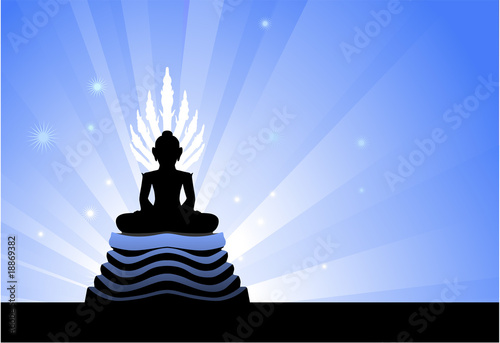 Buddha statue on blue glowing background