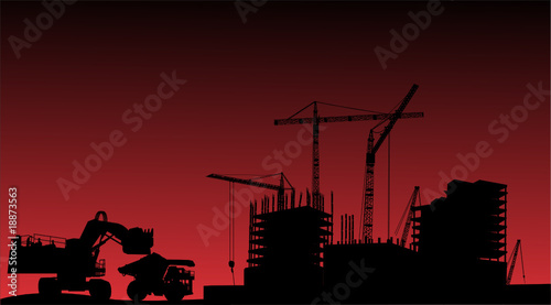 house building, cranes and truck