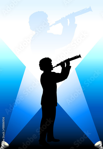 young flute/clarinet player under the bright lights background