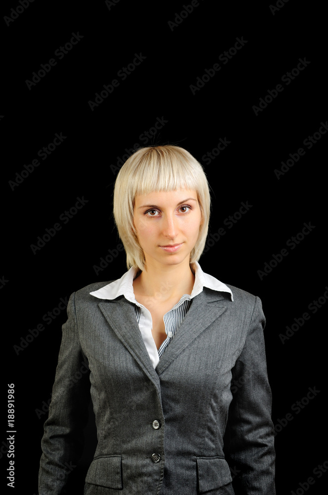 Successful young businesswoman isolated on black Successful young businesswoman isolated on black
