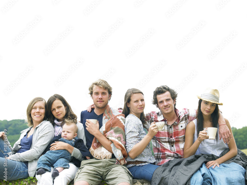 Group of People Relaxing Outdoors With Coffee Group of People Relaxing Outdoors With Coffee