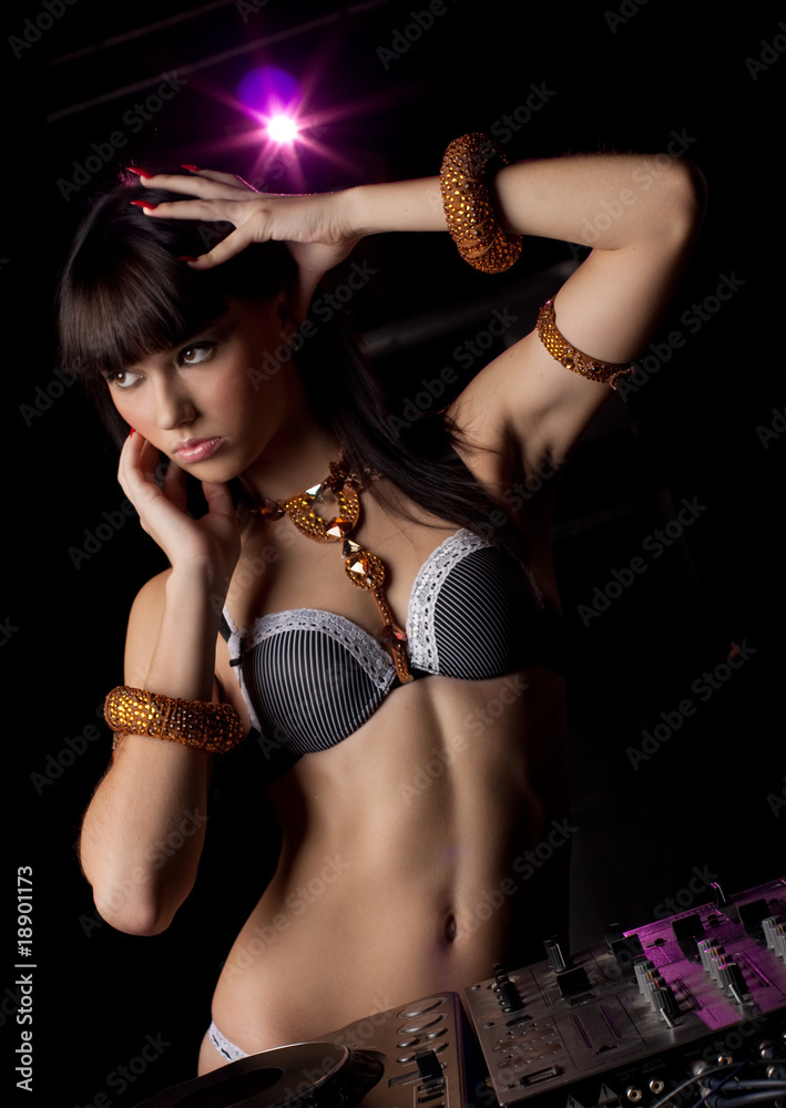 Sexy DJ girl in nightclub in lingerie Photos | Adobe Stock