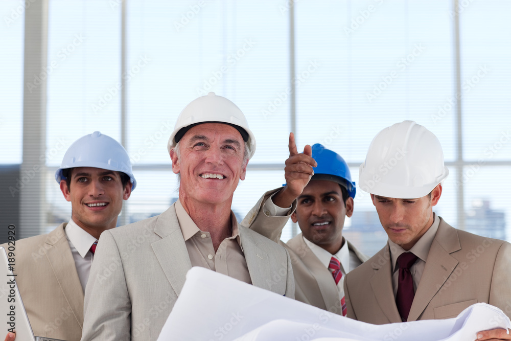A group of architects discussing a construction plan