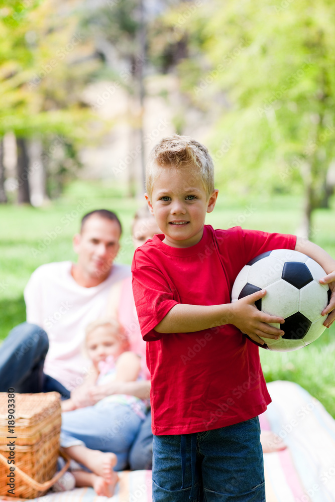 Little boy holding a soccer ball Little boy holding a soccer ball