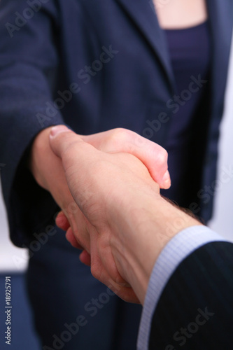 Busisness people - man and woman hand shake