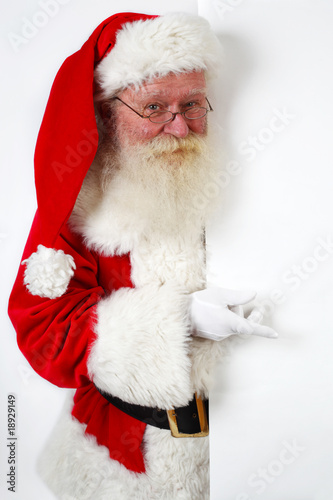 santa pointing at banner