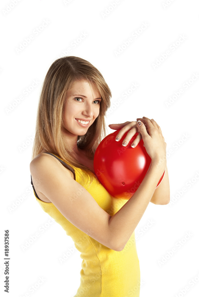 Smiling blond girl with red ball Smiling blond girl with red ball