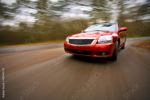 luxury car driving fast