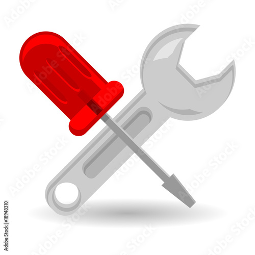 Crossed screwdriver and spanner isolated over white