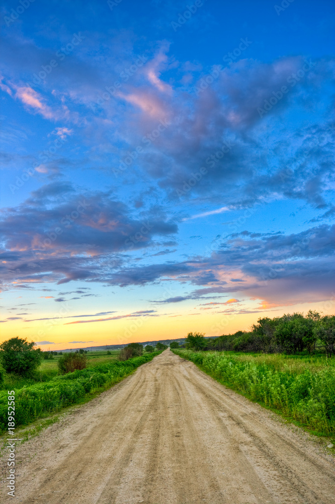 dirt road to sunset