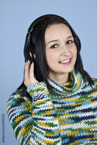 Smiling female listening music