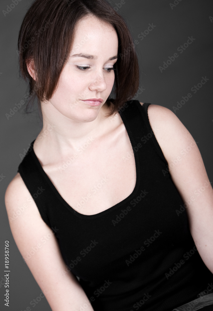 20s Brunette Female Looking Down 20s Brunette Female Looking Down