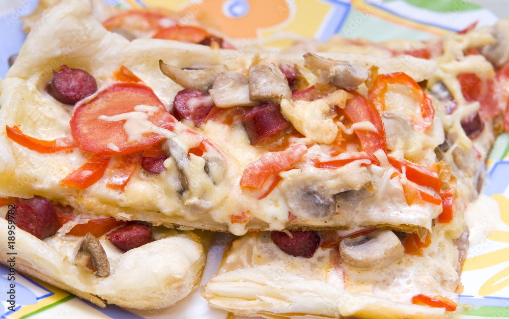 Pizza with mushrooms, red bell pepper, cheese and tomatoes. Pizza with mushrooms, red bell pepper, cheese and tomatoes.