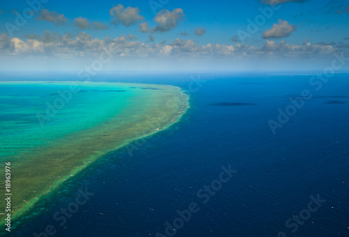 Fototapeta Naklejka Na Ścianę i Meble -  Sunny Aerial View of Arlington Reef in Great Barrier Reef