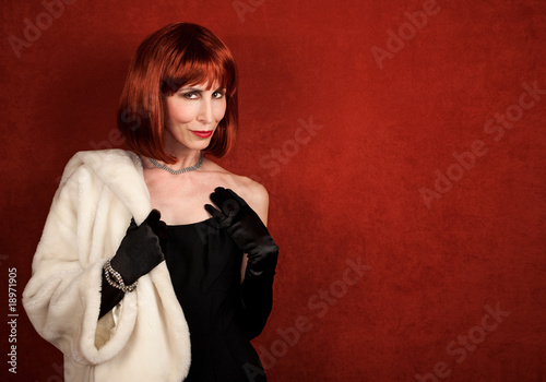 Fotografie Socialite with brassy red hair