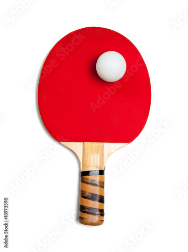 A red ping pong paddle with ball on white © Michael Flippo