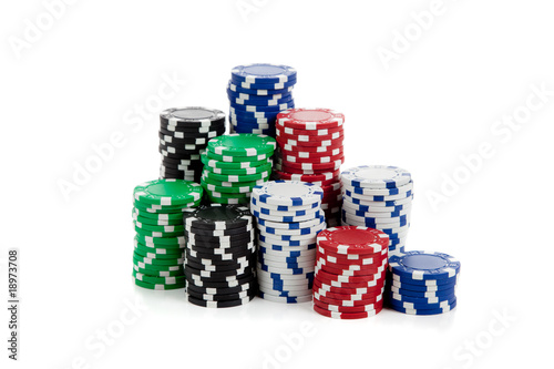 Fotografie Stacks of poker chips on white