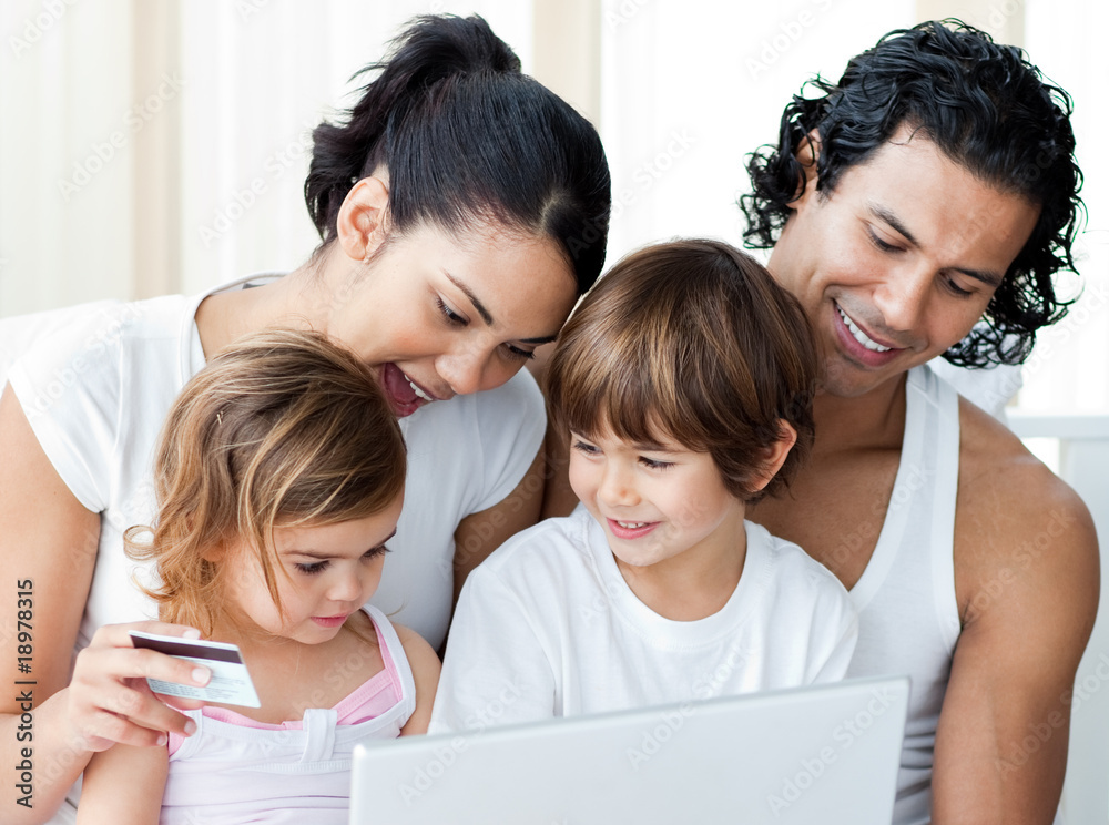 Close-up of a family shopping online Close-up of a family shopping online