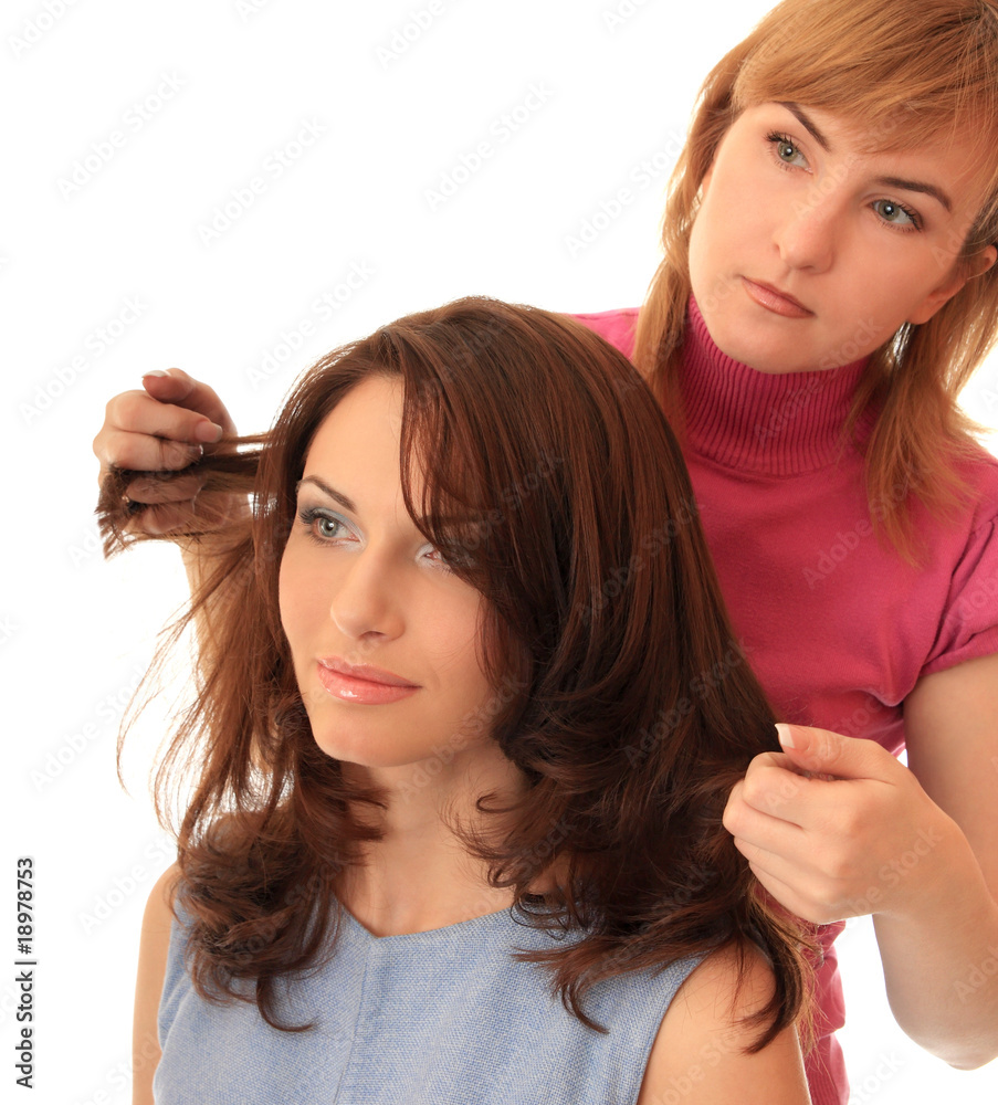 Naklejka premium Stylist makes hair