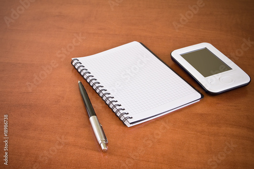pda  notebook and pen