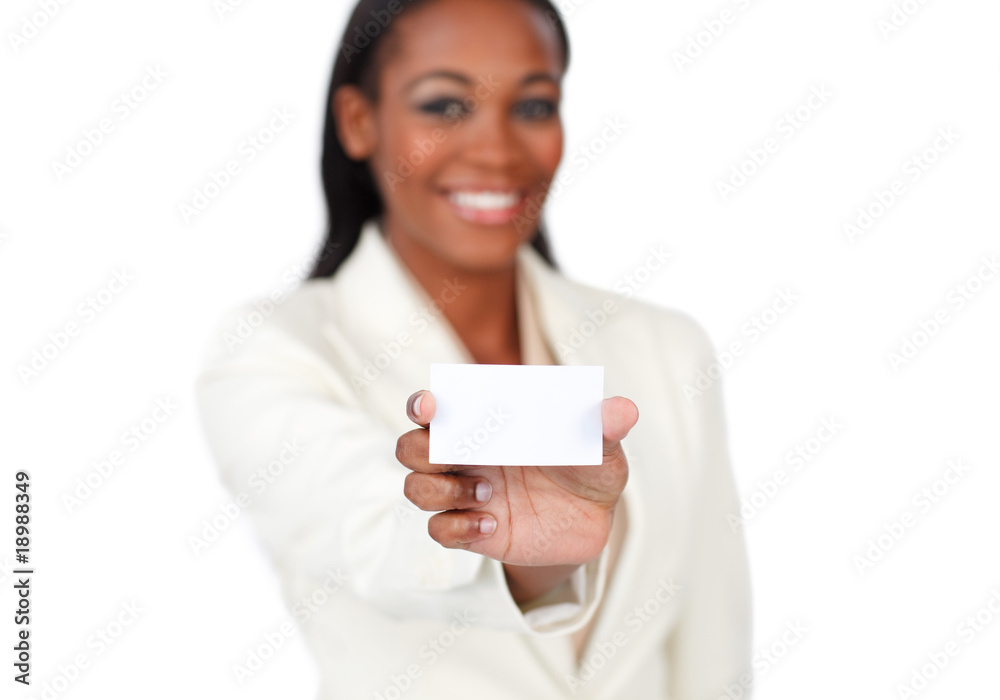 Smiling afro-american businesswoman holding a white card Smiling afro-american businesswoman holding a white card