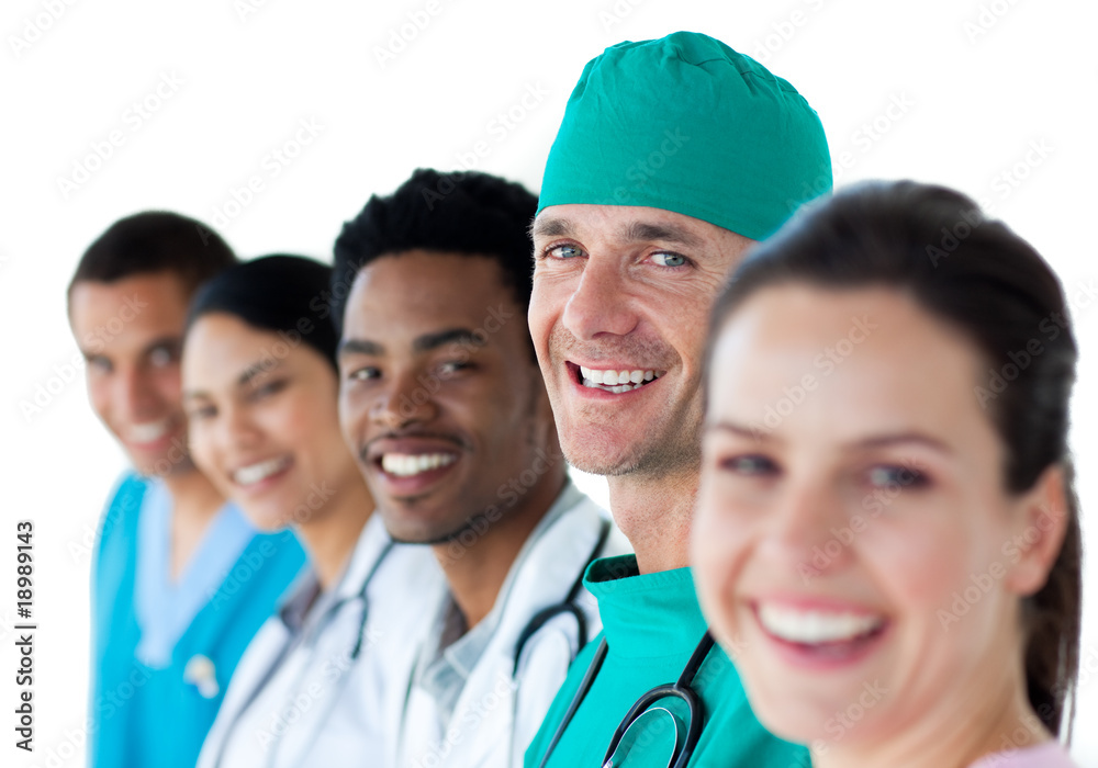 International young medical team smiling at the camera International young medical team smiling at the camera