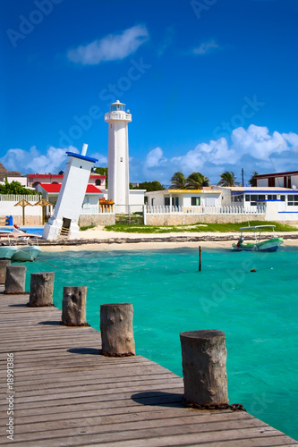 old tilted and new lighthouses in Puerto Morelos, Mexico photo