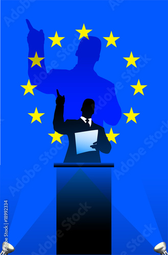 European Union flag with political speaker behind a podium