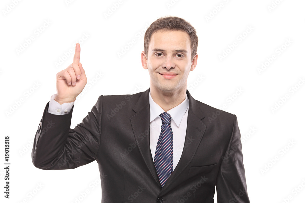A businessman pointing isolated on white background A businessman pointing isolated on white background