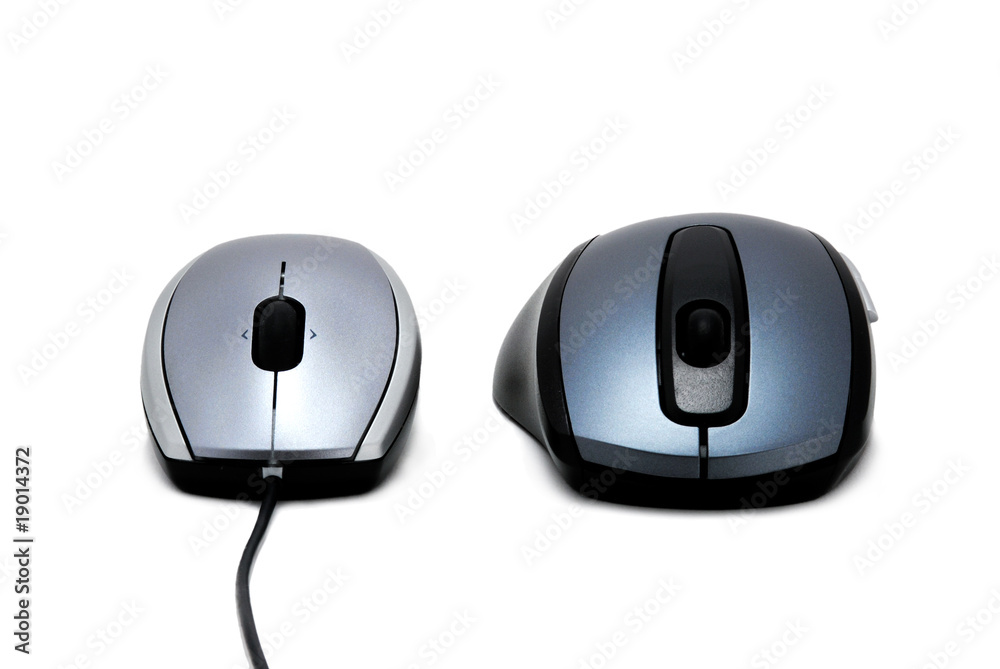 two computer mice isolated over white background two computer mice isolated over white background