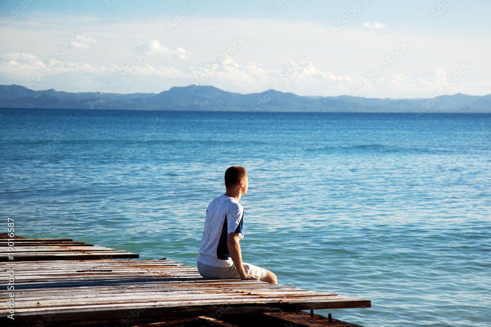 young man relax watch on ocean