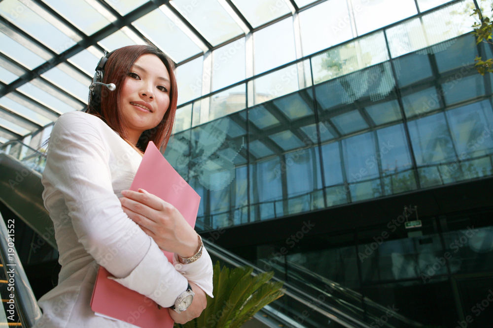Customer Representative holding with folder Customer Representative holding with folder