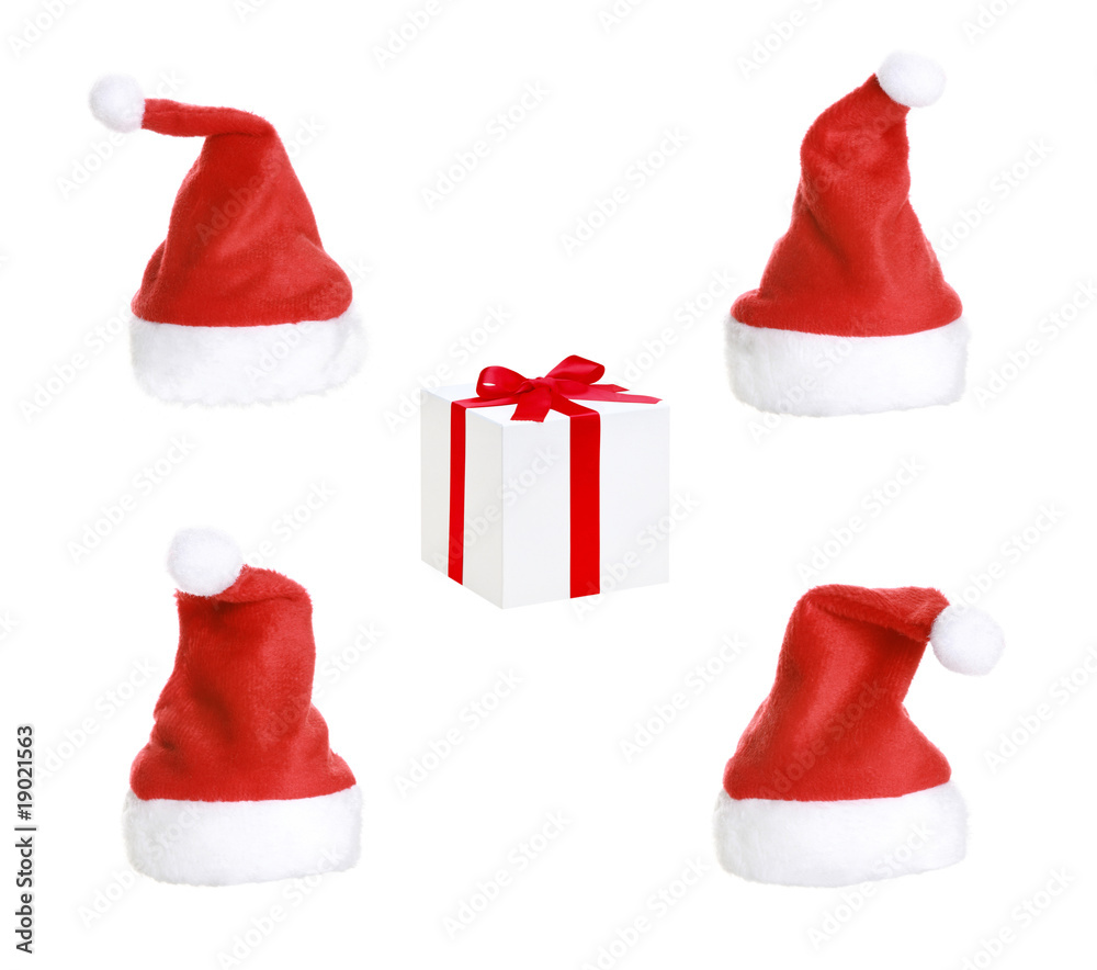 Christmas Hats And Christmas gift On White Background Christmas Hats And Christmas gift On White Background