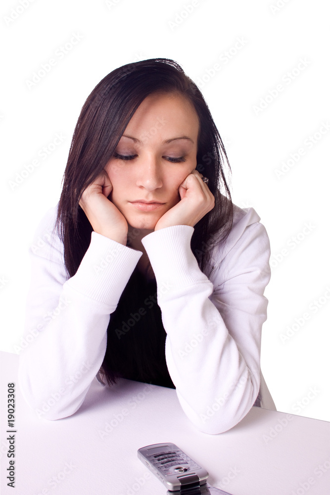 Beautiful Teenager Looking at her Phone Waiting for a Phone Call Beautiful Teenager Looking at her Phone Waiting for a Phone Call