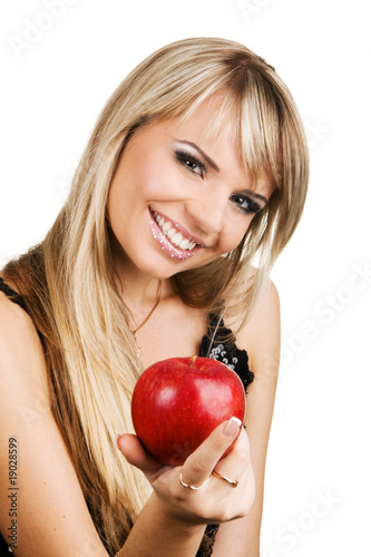 Cheerful young woman with an apple