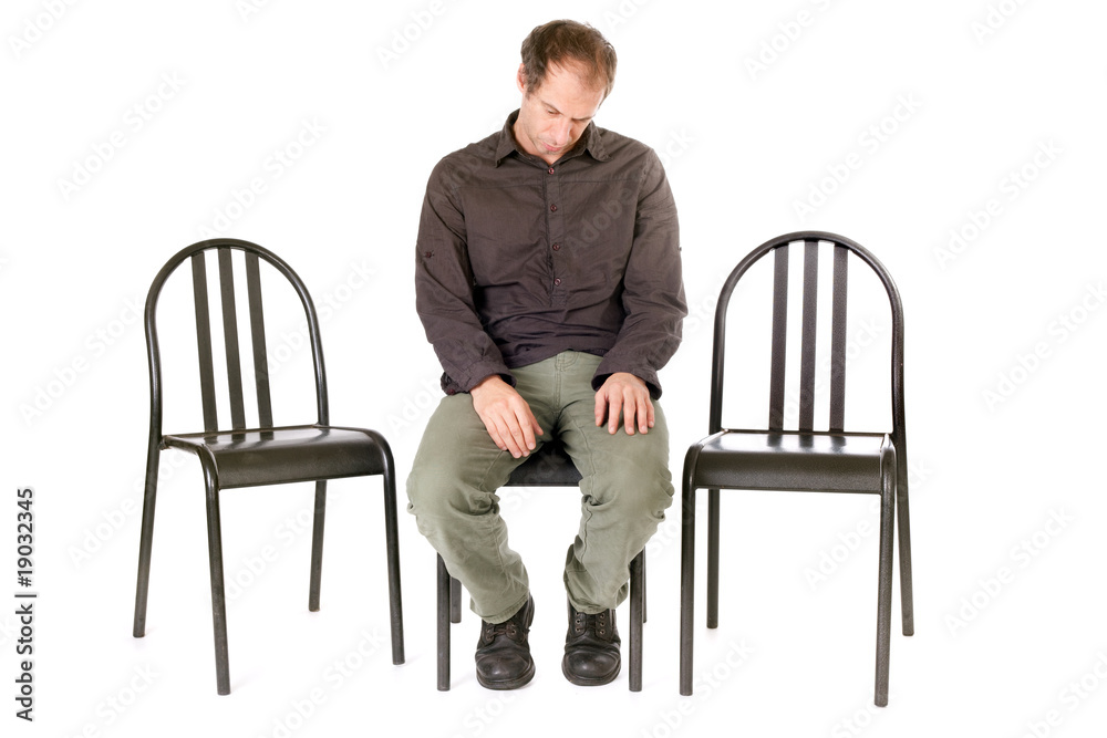 alone depressed man sitting on chair