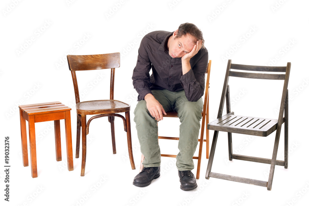 alone sad man sitting on chair