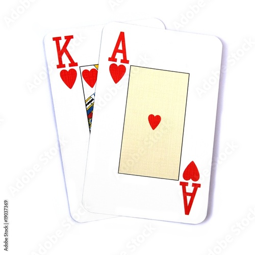 Ace King suited (hearts) poker cards, isolated on white