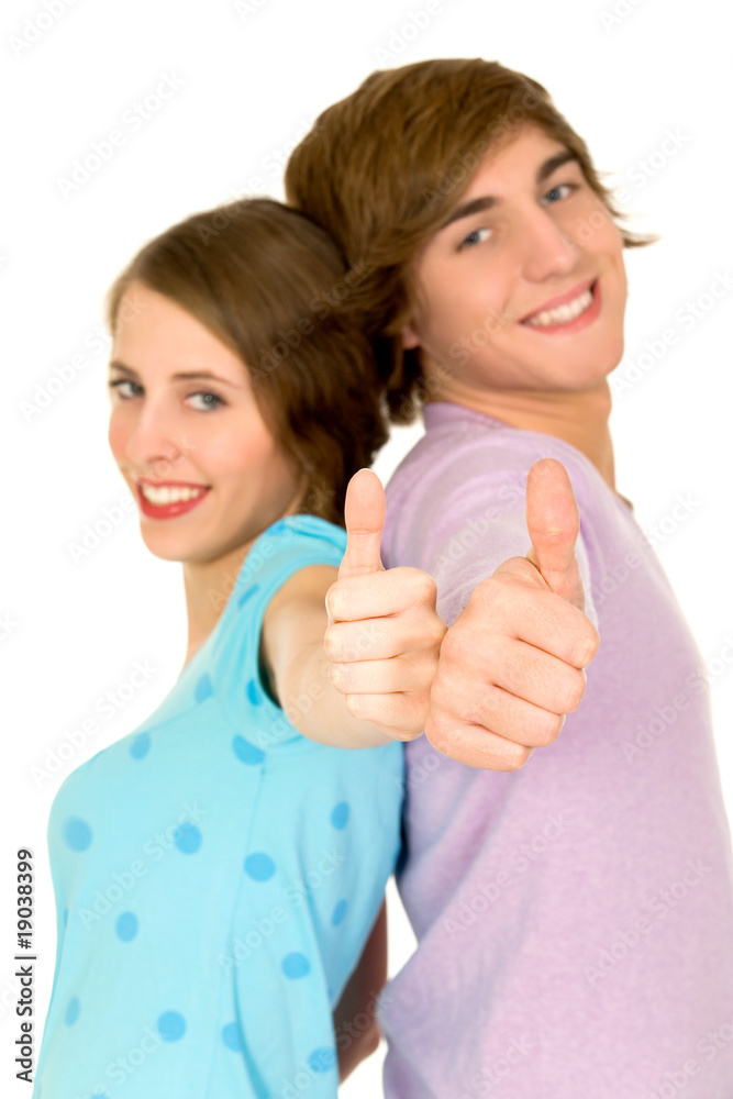 Young couple with thumbs up Young couple with thumbs up
