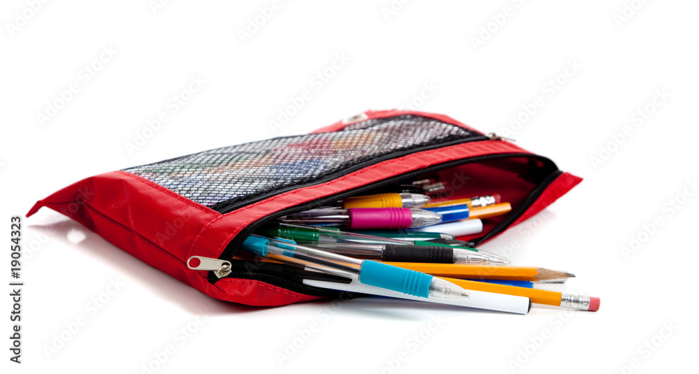 Red pencil bag with supplies on white Red pencil bag with supplies on white