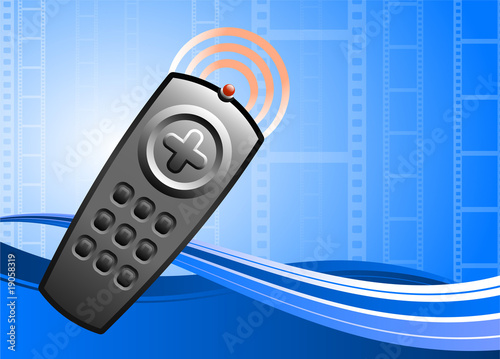 TV remote control on film background