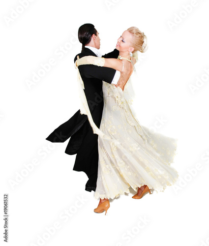 Fotografia young couple dancing over white