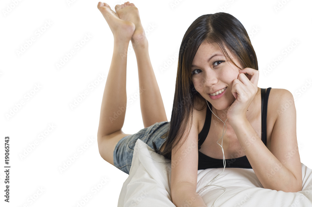 Sexy young girl laying down with pillow Stock Photo | Adobe Stock